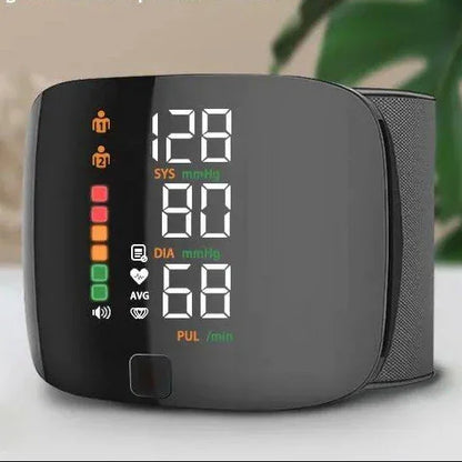 Digital wrist blood pressure monitor with color display showing systolic, diastolic, and pulse readings