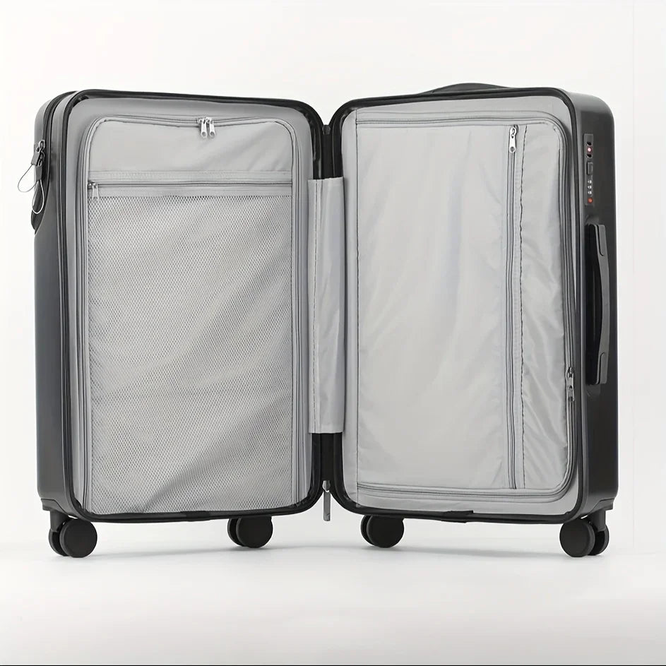 Open hard-shell suitcase with grey interior, mesh divider, and multiple zippered pockets